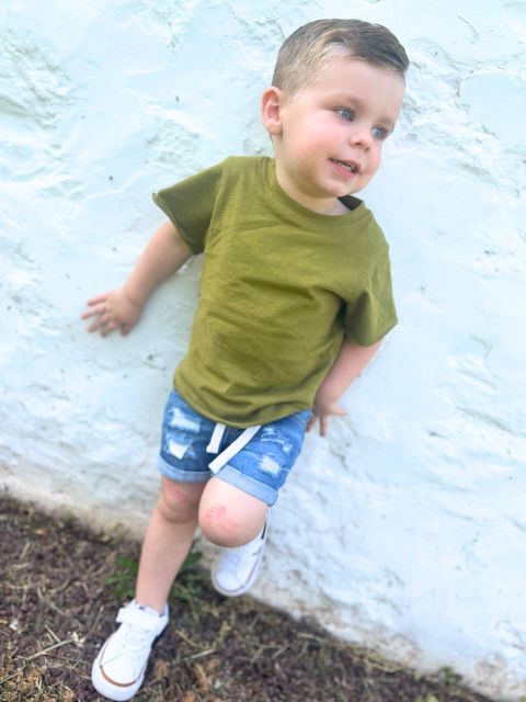Untamed Kids Apparel | Unisex Jean Shorts with tie waist paired with a green shirt